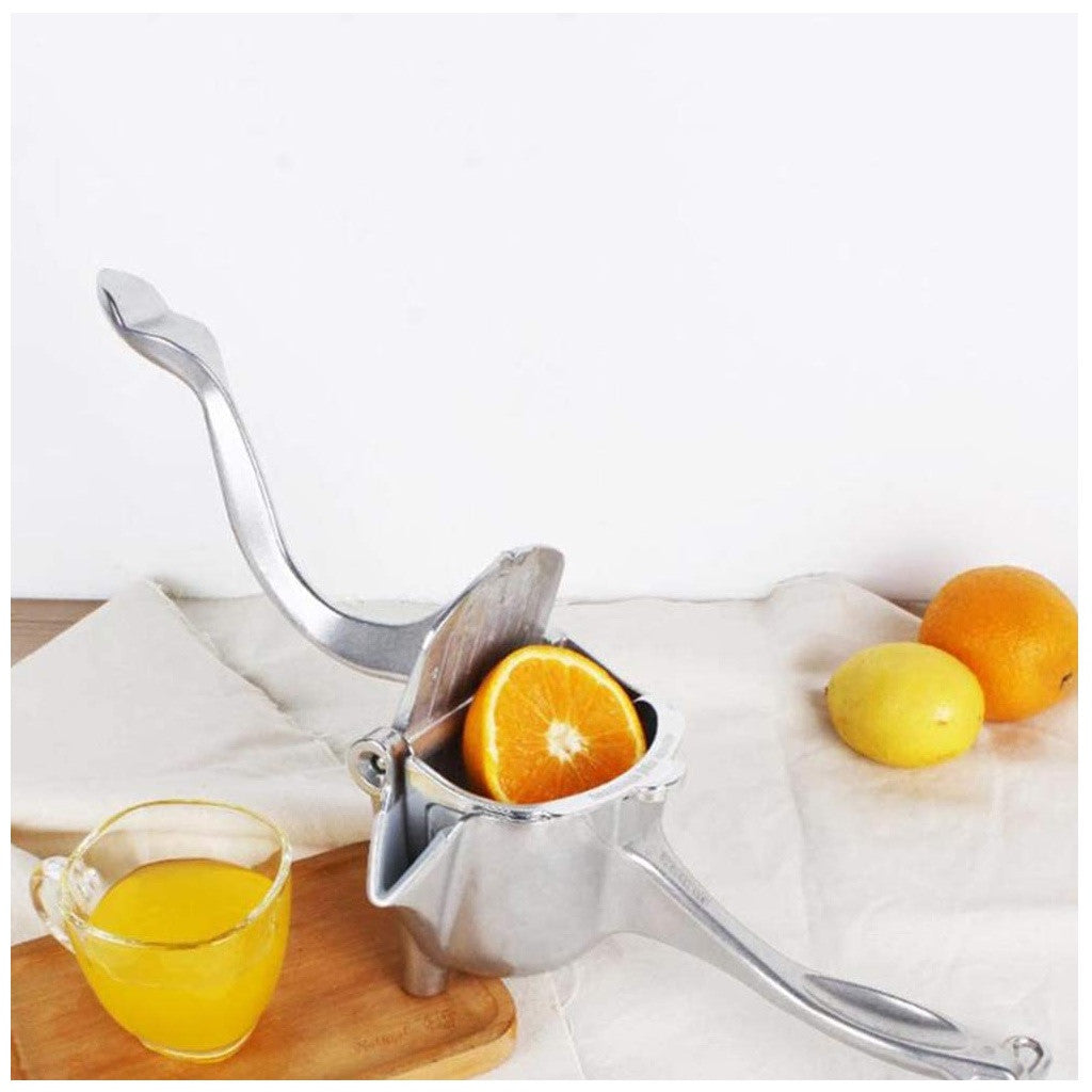Exprimidor de fruta manual